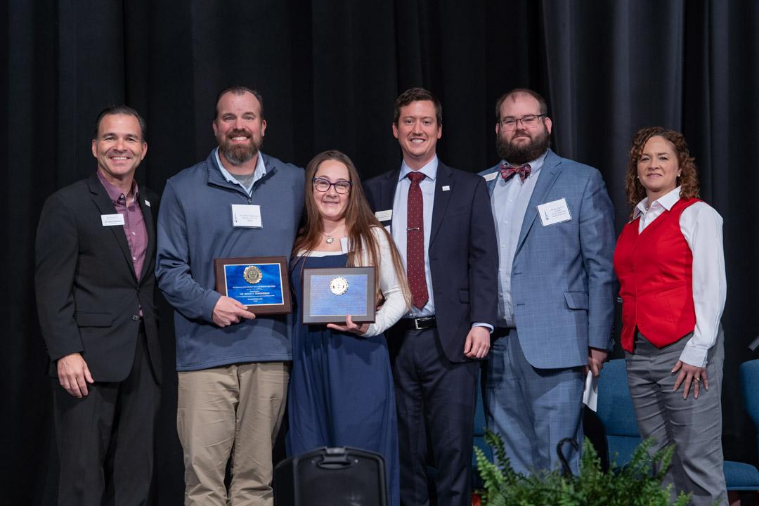 Dr. Bryan & Mindy Zimmerman accept the Volunteers of the Year award