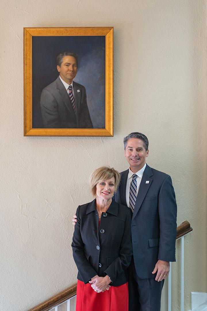 Dr. David and Kathryn Olive with his Presidential Portrait