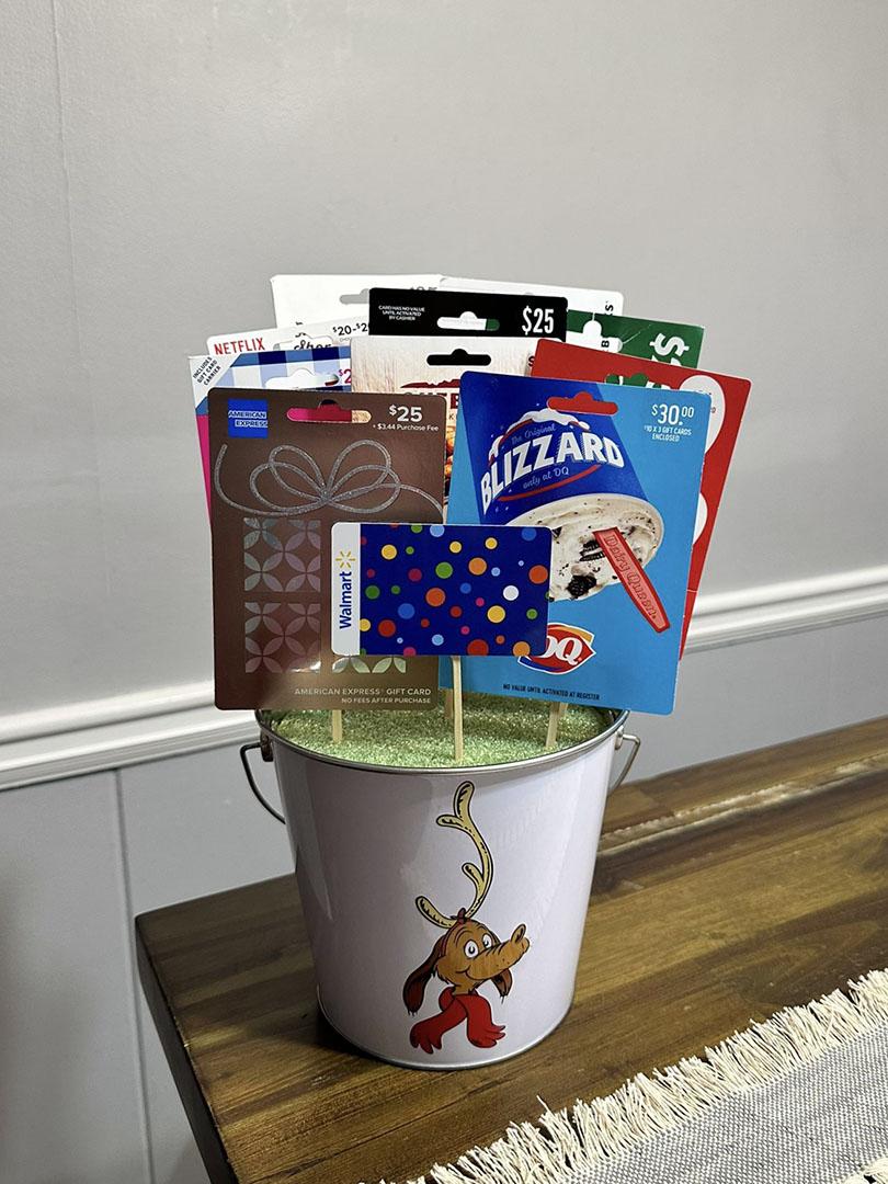 Bucket of various gift cards